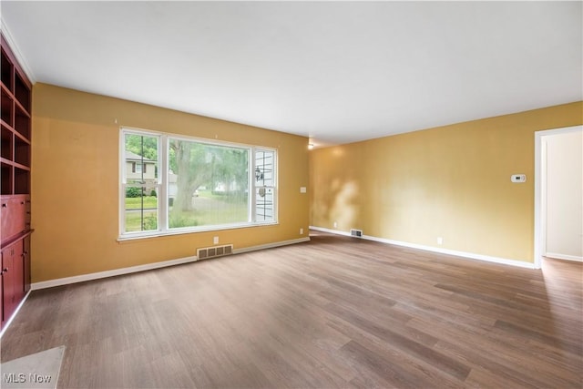 1005 Fairview Blvd, Coshocton, OH 43812 - empty room with wood finished floors