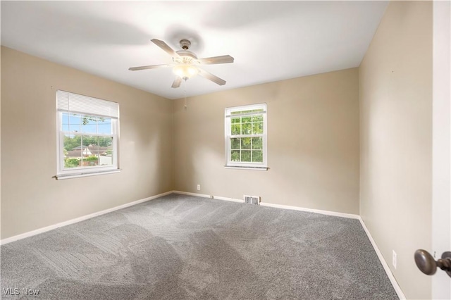 1005 Fairview Blvd, Coshocton, OH 43812 - spare room with carpet flooring and a ceiling fan
