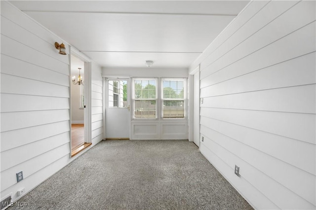 1005 Fairview Blvd, Coshocton, OH 43812 - unfurnished sunroom featuring a chandelier