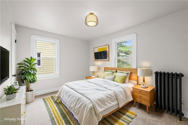 3497 Raymont Blvd, University Heights, OH 44118 - bedroom featuring radiator and light colored carpet
