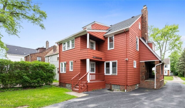 3497 Raymont Blvd, University Heights, OH 44118 - view of front facade with a chimney