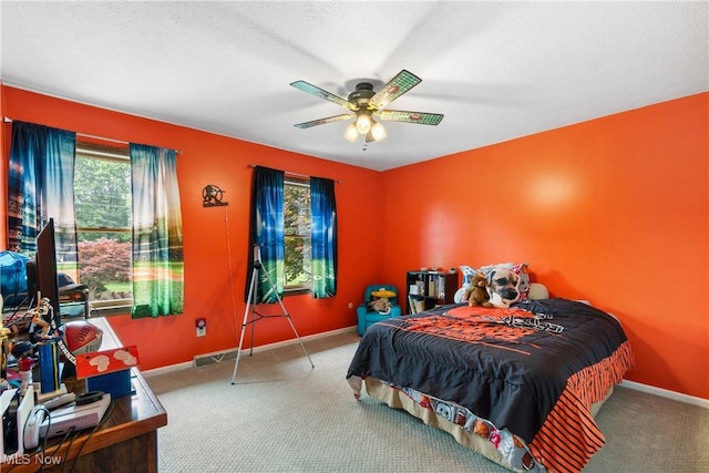 3111 Serfass Rd, New Franklin, OH 44216 - carpeted bedroom featuring baseboards and a ceiling fan