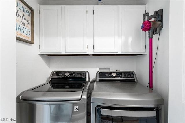 3111 Serfass Rd, New Franklin, OH 44216 - washroom with washer and dryer and cabinet space