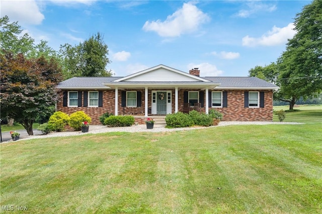 3111 Serfass Rd, New Franklin, OH 44216 - ranch-style home with covered porch, a chimney, a front lawn, and brick siding