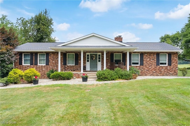 3111 Serfass Rd, New Franklin, OH 44216 - single story home with a chimney, brick siding, a front yard, and a porch