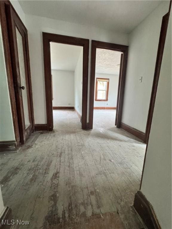 3038 E 130th St, Cleveland, OH 44120 - corridor featuring hardwood / wood-style floors and baseboards