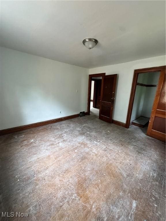 3038 E 130th St, Cleveland, OH 44120 - empty room with baseboards