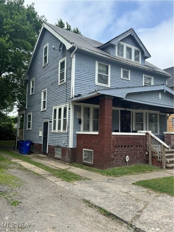 3038 E 130th St, Cleveland, OH 44120 - view of home's exterior with covered porch