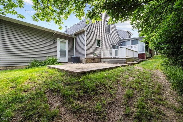14531 Cross Creek Ln Unit 7, North Royalton, OH 44133 - back of house featuring a patio, a deck, and a yard