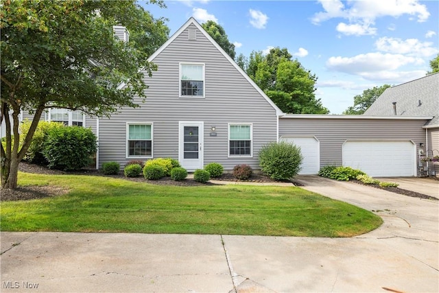 14531 Cross Creek Ln Unit 7, North Royalton, OH 44133 - view of front facade featuring a front lawn, driveway, and an attached garage