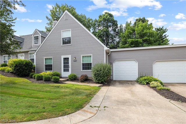 14531 Cross Creek Ln Unit 7, North Royalton, OH 44133 - cape cod house featuring driveway, a front yard, a chimney, and a garage