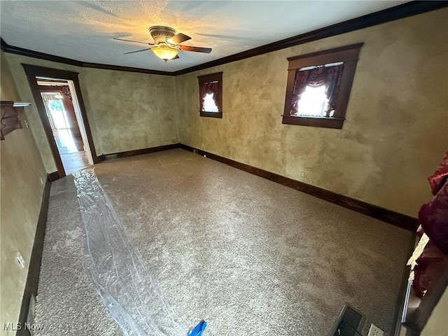 1208 3rd St NW, New Philadelphia, OH 44663 - empty room with a ceiling fan and ornamental molding