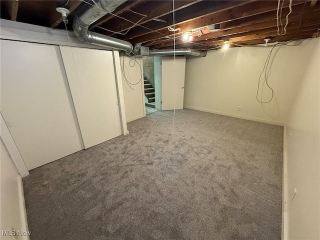1208 3rd St NW, New Philadelphia, OH 44663 - basement with stairway and carpet floors