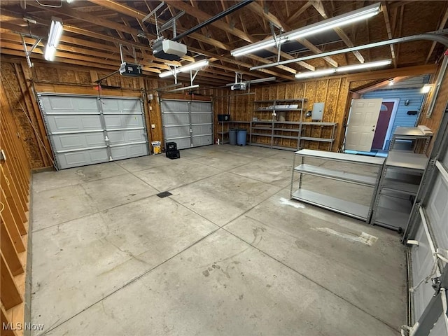 1208 3rd St NW, New Philadelphia, OH 44663 - garage with a garage door opener