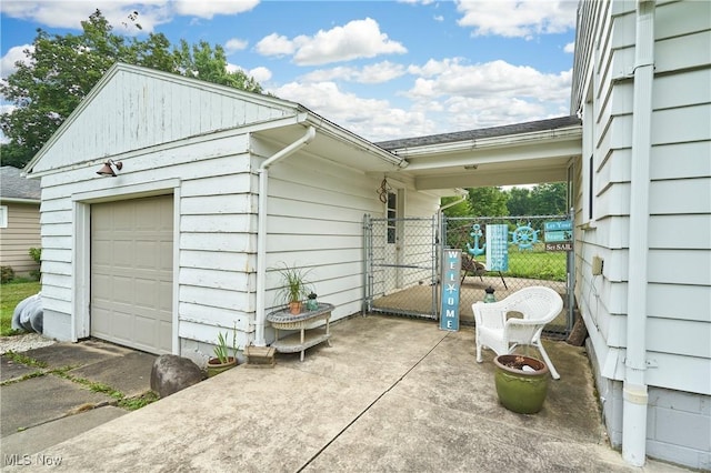 1433 Raleigh Blvd, Copley, OH 44321 - view of home's exterior with a gate and a garage