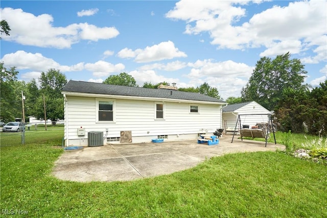 1433 Raleigh Blvd, Copley, OH 44321 - back of property featuring a patio and a chimney