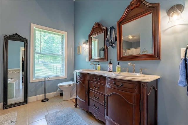 7716 N Ridge Pl, Lisbon, OH 44432 - bathroom with double vanity, tile patterned floors, and a bathtub