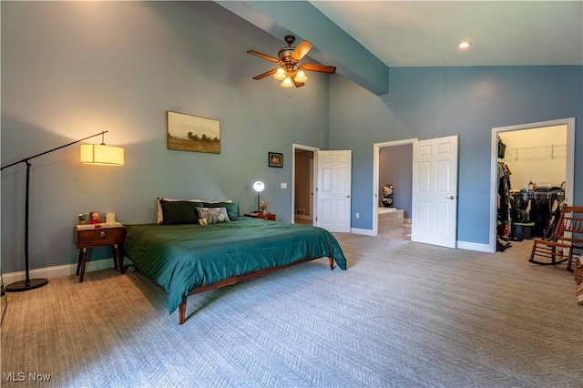 7716 N Ridge Pl, Lisbon, OH 44432 - carpeted bedroom with a walk in closet, high vaulted ceiling, ensuite bathroom, and beamed ceiling