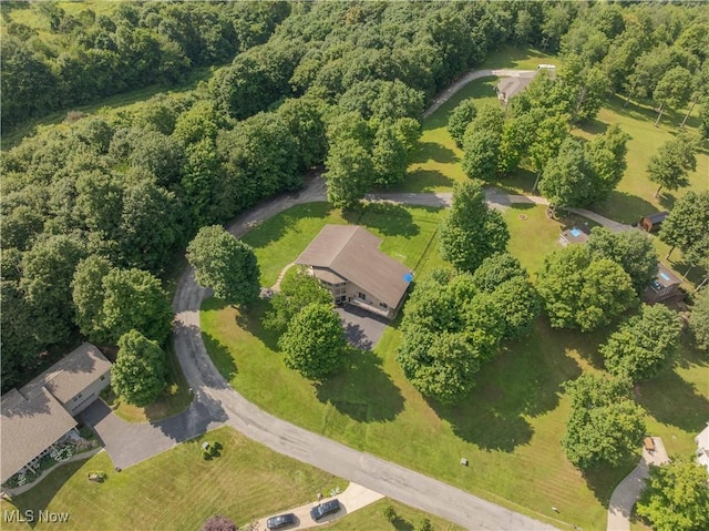 7716 N Ridge Pl, Lisbon, OH 44432 - aerial view of property's location with a heavily wooded area
