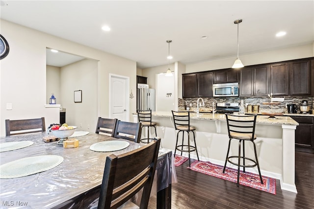 464 Marfa Cir, Copley, OH 44321 - dining room featuring dark wood-type flooring and recessed lighting