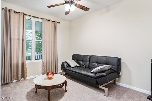464 Marfa Cir, Copley, OH 44321 - carpeted living area featuring a ceiling fan and baseboards