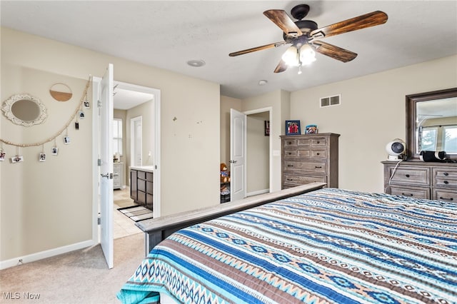 464 Marfa Cir, Copley, OH 44321 - bedroom with light colored carpet, ensuite bath, and ceiling fan