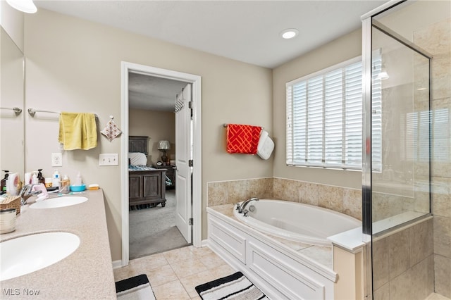 464 Marfa Cir, Copley, OH 44321 - bathroom featuring ensuite bath, a garden tub, tile patterned flooring, double vanity, and a stall shower