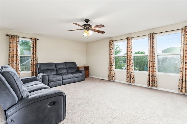 464 Marfa Cir, Copley, OH 44321 - living area featuring ceiling fan, carpet flooring, and healthy amount of natural light