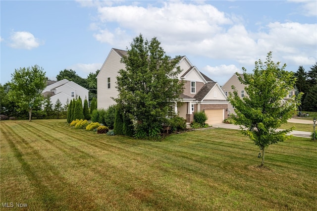 464 Marfa Cir, Copley, OH 44321 - view of front of property with concrete driveway, a front lawn, and a garage
