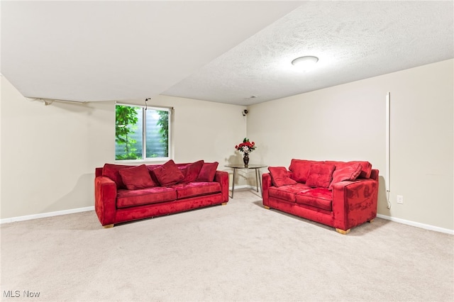 464 Marfa Cir, Copley, OH 44321 - carpeted living area featuring a textured ceiling and baseboards