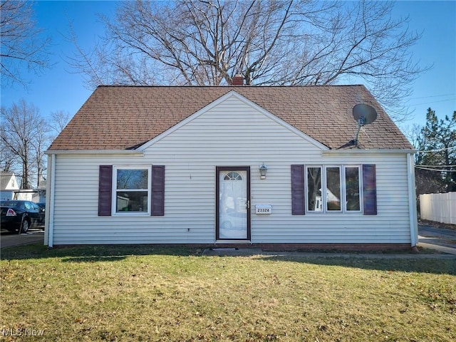 23326 Roger, Euclid, OH 44123 - view of front of property with roof with shingles, a front lawn, and a chimney