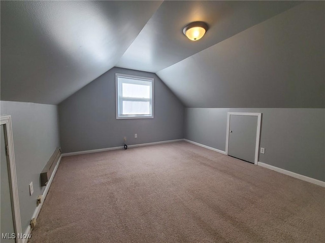 23326 Roger, Euclid, OH 44123 - additional living space with carpet floors, vaulted ceiling, and baseboard heating