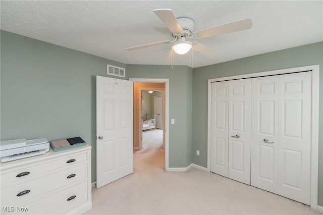 23450 Wainwright Ter, Olmsted Falls, OH 44138 - unfurnished bedroom with light colored carpet, a closet, and ceiling fan