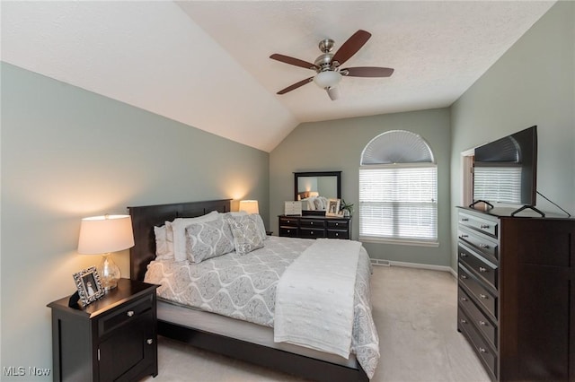 23450 Wainwright Ter, Olmsted Falls, OH 44138 - bedroom featuring light carpet, vaulted ceiling, and ceiling fan