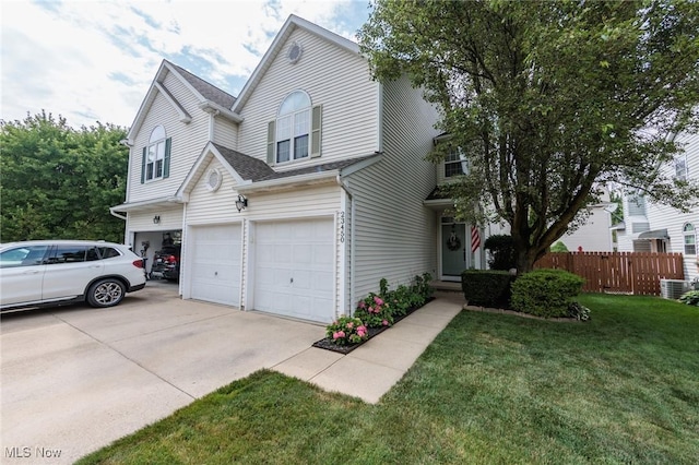23450 Wainwright Ter, Olmsted Falls, OH 44138 - traditional-style house with an attached garage, concrete driveway, and a shingled roof