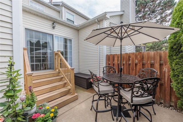 23450 Wainwright Ter, Olmsted Falls, OH 44138 - view of patio / terrace with entry steps and outdoor dining area