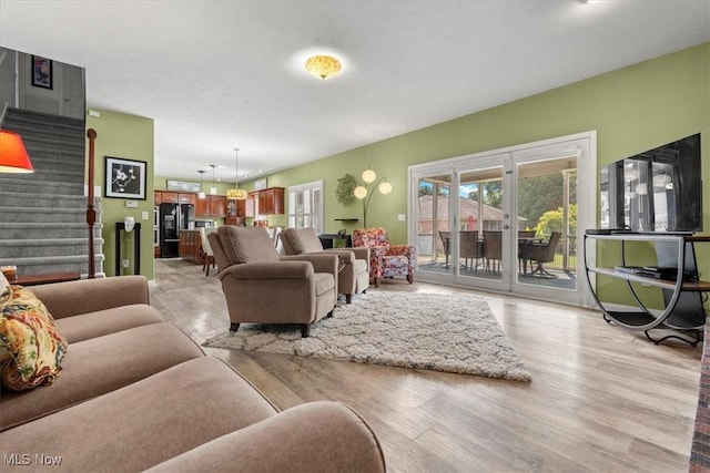 1103 Greenmont Cir, Vienna, WV 26105 - living room with light wood finished floors and stairway