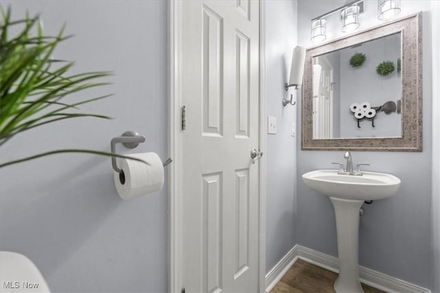 1103 Greenmont Cir, Vienna, WV 26105 - half bath featuring baseboards and wood finished floors