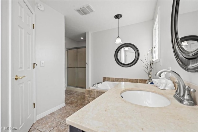 1103 Greenmont Cir, Vienna, WV 26105 - bathroom with a stall shower, tile patterned flooring, vanity, and a bath