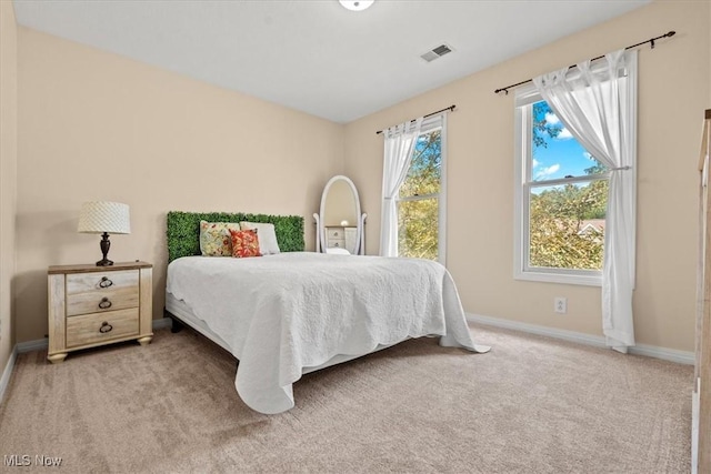 1103 Greenmont Cir, Vienna, WV 26105 - bedroom featuring light carpet