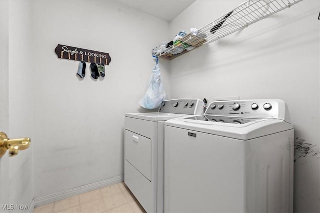 1103 Greenmont Cir, Vienna, WV 26105 - laundry room with separate washer and dryer and baseboards