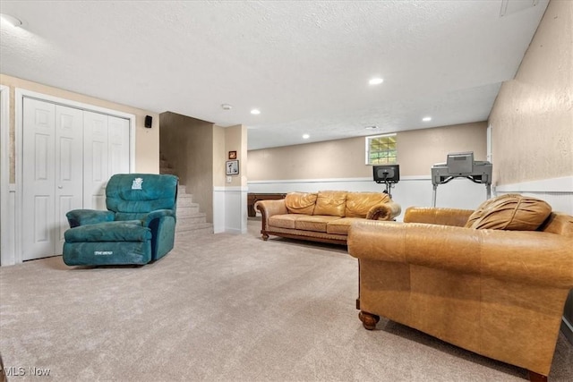 1103 Greenmont Cir, Vienna, WV 26105 - carpeted living room featuring stairs and recessed lighting