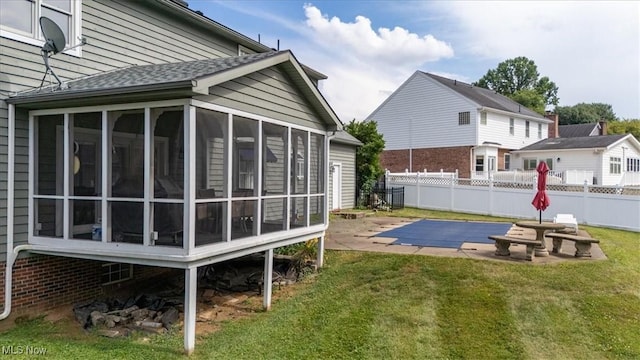1103 Greenmont Cir, Vienna, WV 26105 - view of yard with a sunroom and a patio area