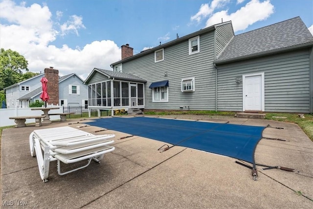 1103 Greenmont Cir, Vienna, WV 26105 - view of pool with a sunroom and a patio area