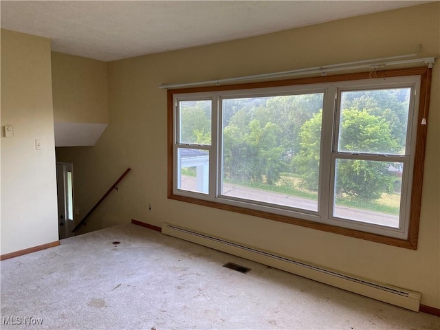 100 Crestview Dr, Newcomerstown, OH 43832 - carpeted spare room with a baseboard radiator and baseboards