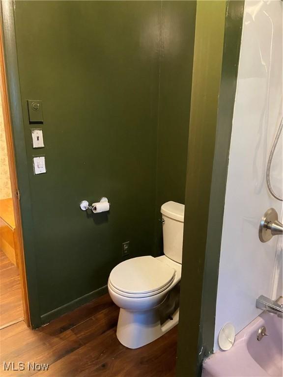 100 Crestview Dr, Newcomerstown, OH 43832 - full bathroom with wood finished floors and  shower combination