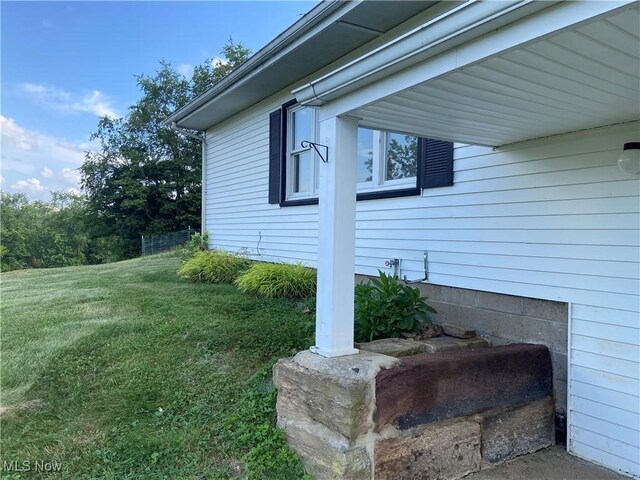 100 Crestview Dr, Newcomerstown, OH 43832 - view of property exterior featuring a yard