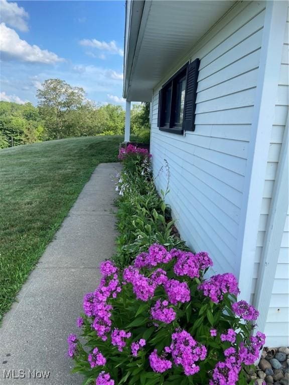 100 Crestview Dr, Newcomerstown, OH 43832 - view of property exterior with a lawn