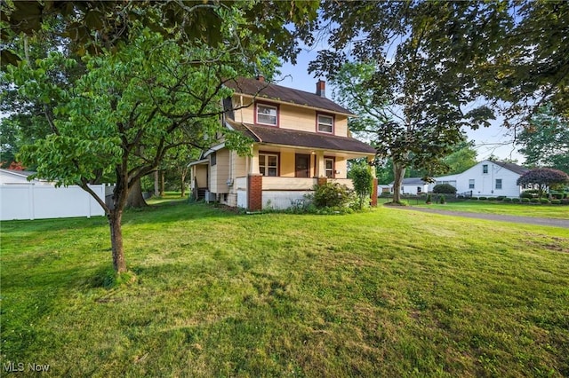 57 Charles Ave, Boardman, OH 44512 - view of front of property with a chimney and covered porch
