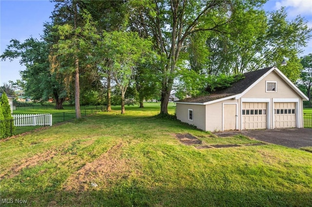 57 Charles Ave, Boardman, OH 44512 - view of yard featuring an outbuilding and a detached garage